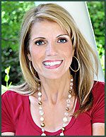 photo of Mardie Caldwell, C.O.A.P. in red top